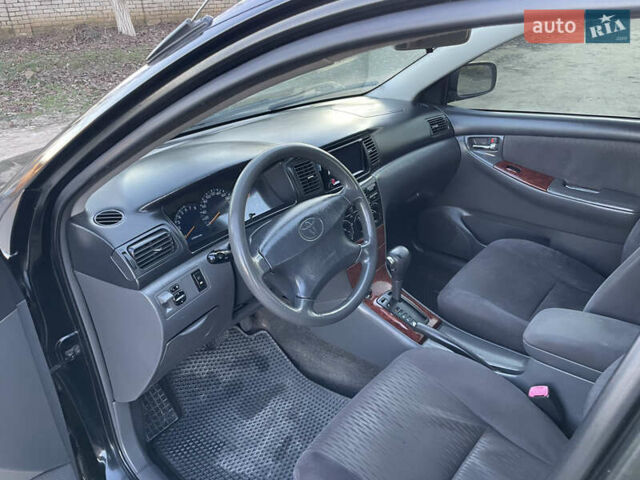 Чорний Тойота Королла, об'ємом двигуна 1.79 л та пробігом 340 тис. км за 3900 $, фото 5 на Automoto.ua