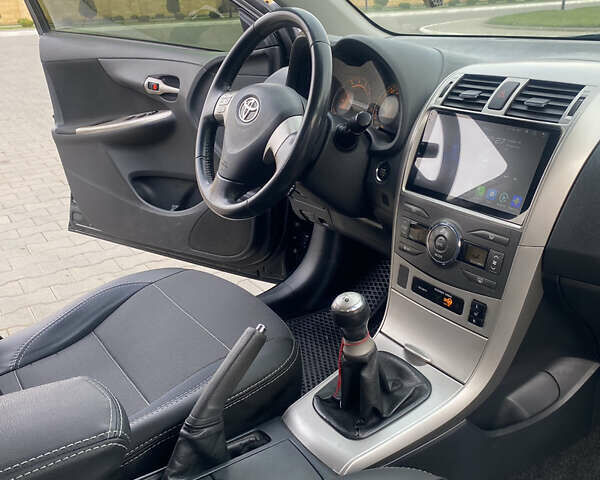 Чорний Тойота Королла, об'ємом двигуна 1.6 л та пробігом 138 тис. км за 8700 $, фото 16 на Automoto.ua