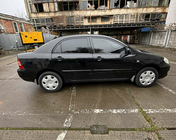 Черный Тойота Королла, объемом двигателя 1.6 л и пробегом 211 тыс. км за 6200 $, фото 10 на Automoto.ua