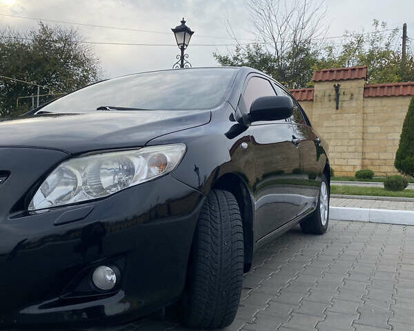 Чорний Тойота Королла, об'ємом двигуна 1.6 л та пробігом 138 тис. км за 8700 $, фото 10 на Automoto.ua