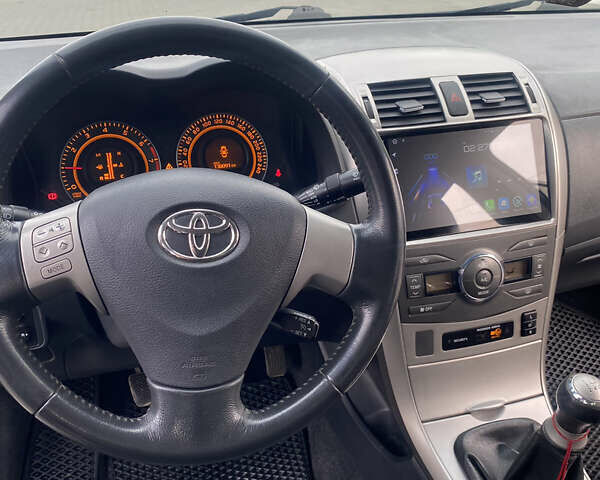 Чорний Тойота Королла, об'ємом двигуна 1.6 л та пробігом 138 тис. км за 8700 $, фото 17 на Automoto.ua