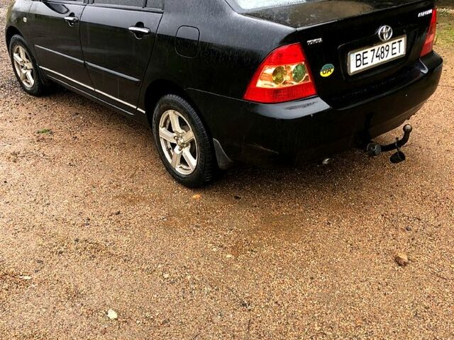 Черный Тойота Королла, объемом двигателя 1.6 л и пробегом 265 тыс. км за 3900 $, фото 3 на Automoto.ua