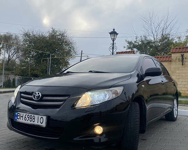 Чорний Тойота Королла, об'ємом двигуна 1.6 л та пробігом 138 тис. км за 8700 $, фото 2 на Automoto.ua