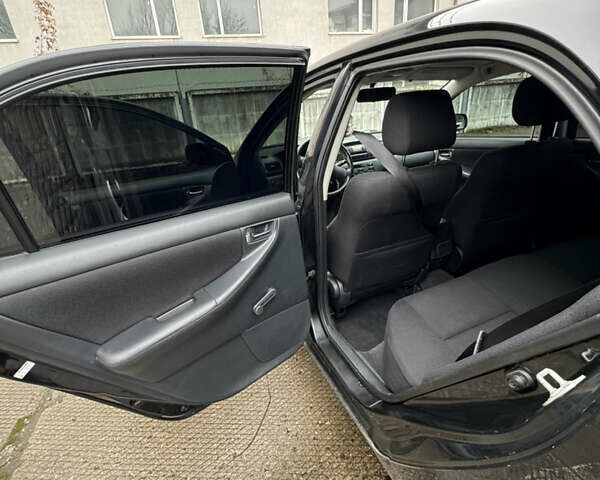 Черный Тойота Королла, объемом двигателя 1.6 л и пробегом 211 тыс. км за 6200 $, фото 6 на Automoto.ua