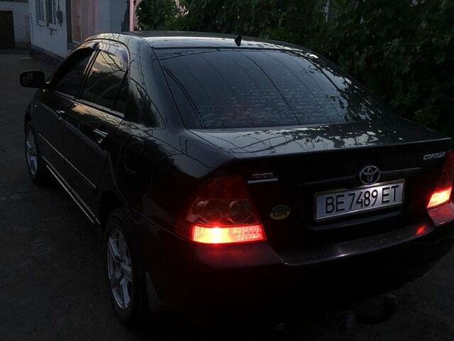 Чорний Тойота Королла, об'ємом двигуна 1.6 л та пробігом 265 тис. км за 3900 $, фото 6 на Automoto.ua