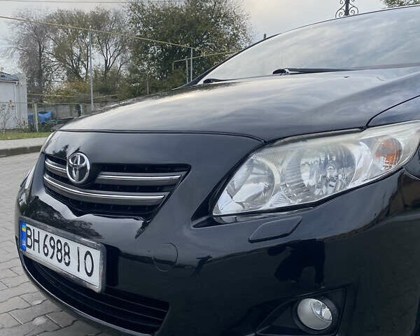 Чорний Тойота Королла, об'ємом двигуна 1.6 л та пробігом 138 тис. км за 8700 $, фото 9 на Automoto.ua