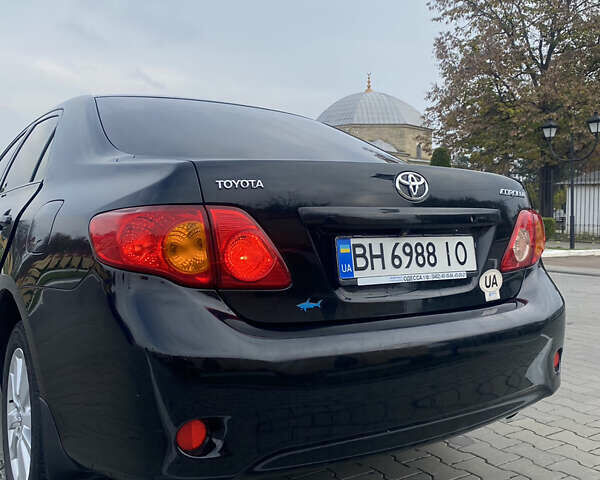 Чорний Тойота Королла, об'ємом двигуна 1.6 л та пробігом 138 тис. км за 8700 $, фото 1 на Automoto.ua