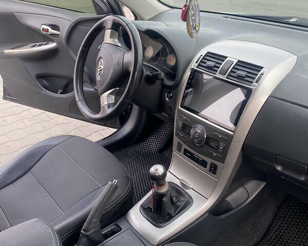 Чорний Тойота Королла, об'ємом двигуна 1.6 л та пробігом 138 тис. км за 8700 $, фото 22 на Automoto.ua