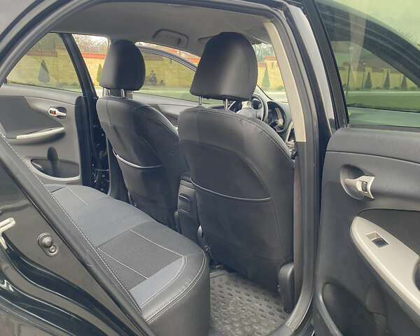 Чорний Тойота Королла, об'ємом двигуна 1.6 л та пробігом 138 тис. км за 8700 $, фото 24 на Automoto.ua