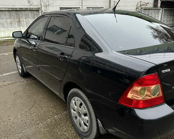 Черный Тойота Королла, объемом двигателя 1.6 л и пробегом 211 тыс. км за 6200 $, фото 2 на Automoto.ua