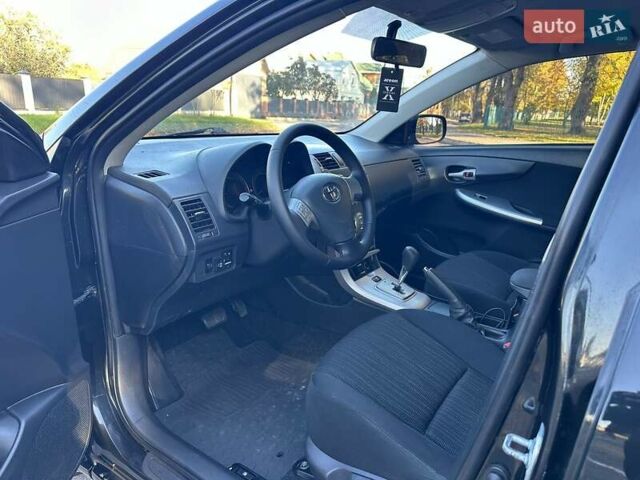 Чорний Тойота Королла, об'ємом двигуна 1.6 л та пробігом 193 тис. км за 5999 $, фото 25 на Automoto.ua