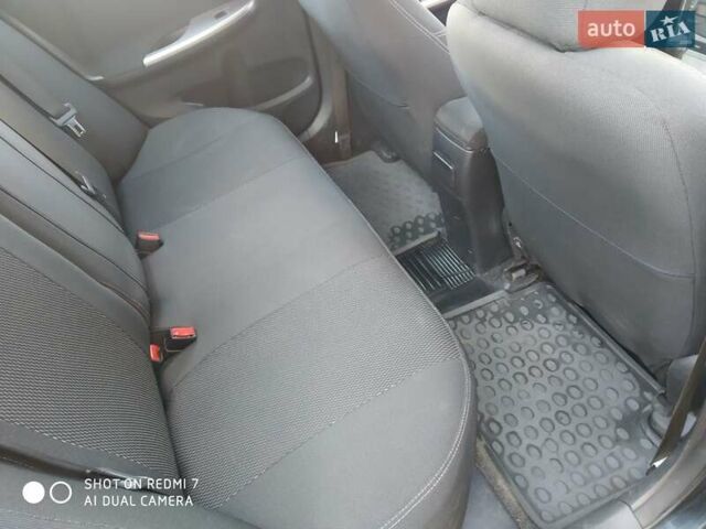 Чорний Тойота Королла, об'ємом двигуна 1.6 л та пробігом 215 тис. км за 7500 $, фото 7 на Automoto.ua