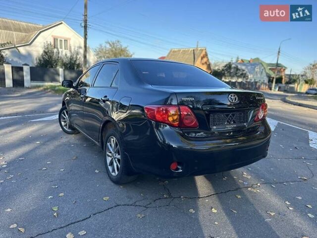 Чорний Тойота Королла, об'ємом двигуна 1.6 л та пробігом 193 тис. км за 5999 $, фото 33 на Automoto.ua