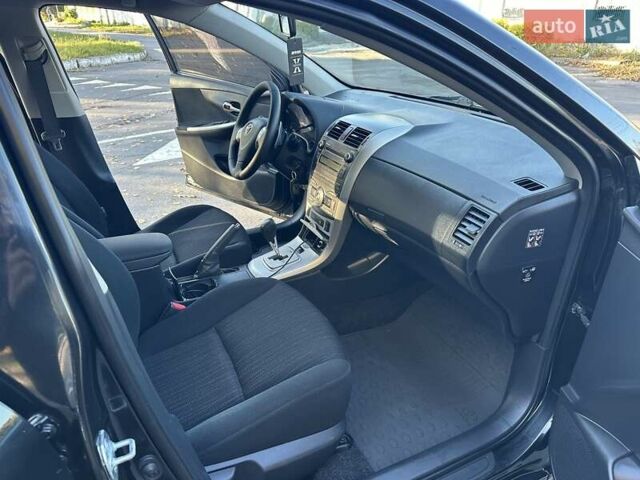 Чорний Тойота Королла, об'ємом двигуна 1.6 л та пробігом 193 тис. км за 5999 $, фото 26 на Automoto.ua