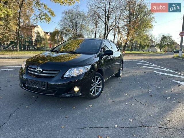 Чорний Тойота Королла, об'ємом двигуна 1.6 л та пробігом 193 тис. км за 5999 $, фото 54 на Automoto.ua