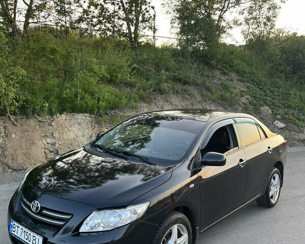 Черный Тойота Королла, объемом двигателя 1.6 л и пробегом 290 тыс. км за 5299 $, фото 12 на Automoto.ua