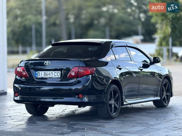 Чорний Тойота Королла, об'ємом двигуна 1.6 л та пробігом 221 тис. км за 6799 $, фото 2 на Automoto.ua