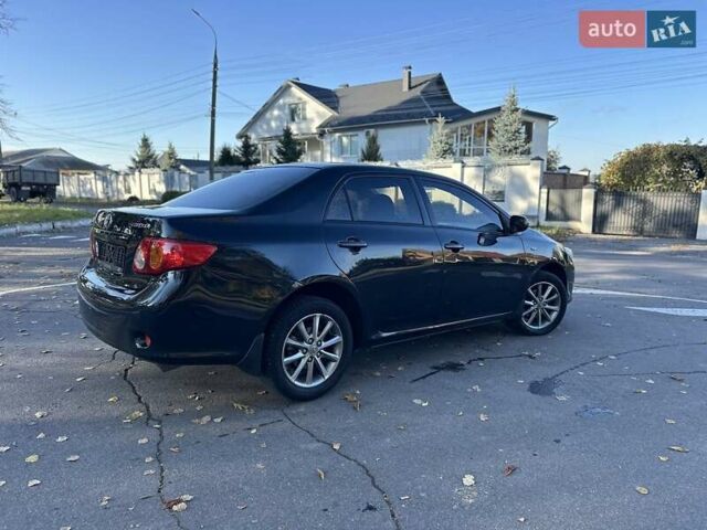 Чорний Тойота Королла, об'ємом двигуна 1.6 л та пробігом 193 тис. км за 5999 $, фото 45 на Automoto.ua