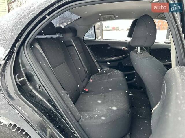 Черный Тойота Королла, объемом двигателя 1.6 л и пробегом 316 тыс. км за 6990 $, фото 10 на Automoto.ua