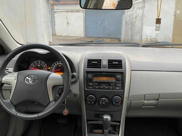 Чорний Тойота Королла, об'ємом двигуна 1.8 л та пробігом 205 тис. км за 5500 $, фото 9 на Automoto.ua