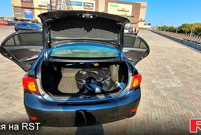 Чорний Тойота Королла, об'ємом двигуна 1.6 л та пробігом 254 тис. км за 6700 $, фото 6 на Automoto.ua