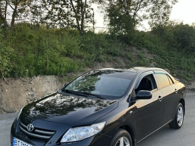 Чорний Тойота Королла, об'ємом двигуна 1.6 л та пробігом 290 тис. км за 5399 $, фото 1 на Automoto.ua