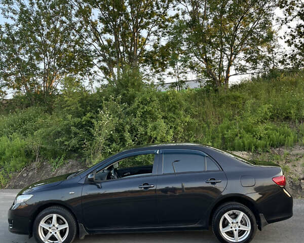 Черный Тойота Королла, объемом двигателя 1.6 л и пробегом 290 тыс. км за 5299 $, фото 11 на Automoto.ua