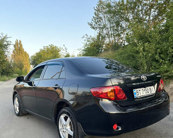 Черный Тойота Королла, объемом двигателя 1.6 л и пробегом 290 тыс. км за 5299 $, фото 10 на Automoto.ua