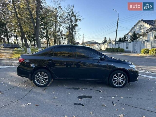 Чорний Тойота Королла, об'ємом двигуна 1.6 л та пробігом 193 тис. км за 5999 $, фото 30 на Automoto.ua