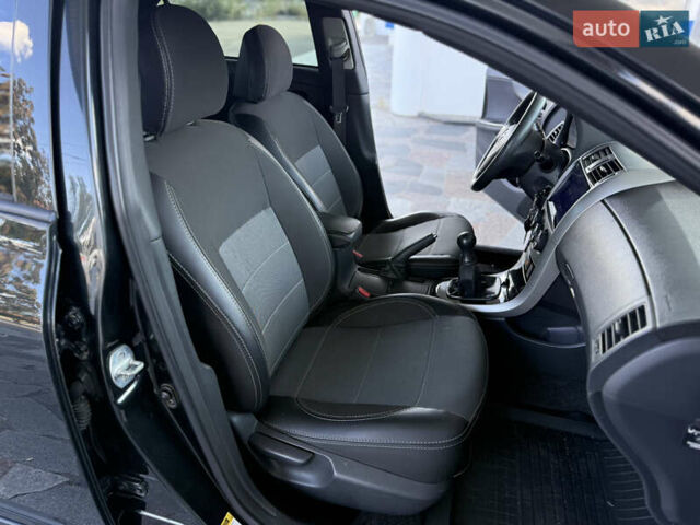 Чорний Тойота Королла, об'ємом двигуна 1.6 л та пробігом 221 тис. км за 6799 $, фото 6 на Automoto.ua