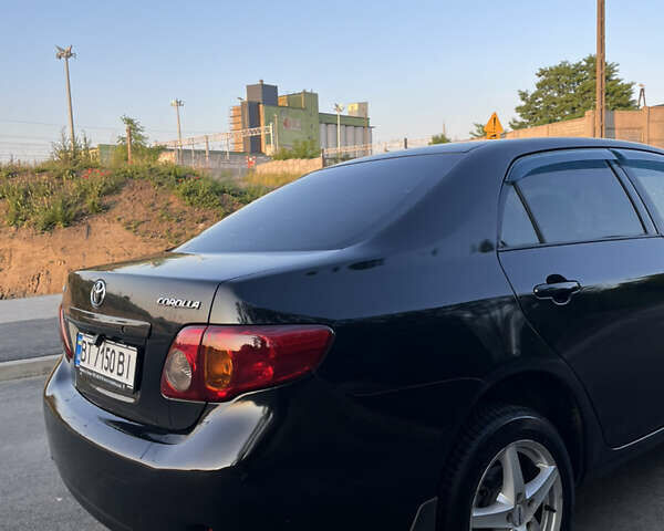 Черный Тойота Королла, объемом двигателя 1.6 л и пробегом 290 тыс. км за 5299 $, фото 6 на Automoto.ua