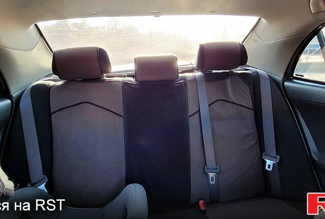 Чорний Тойота Королла, об'ємом двигуна 1.6 л та пробігом 254 тис. км за 6700 $, фото 8 на Automoto.ua