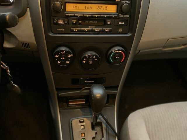 Чорний Тойота Королла, об'ємом двигуна 1.8 л та пробігом 204 тис. км за 5299 $, фото 11 на Automoto.ua