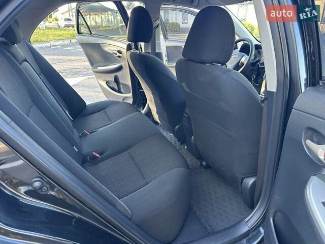 Чорний Тойота Королла, об'ємом двигуна 1.6 л та пробігом 193 тис. км за 5999 $, фото 2 на Automoto.ua
