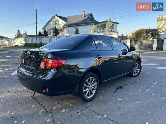 Чорний Тойота Королла, об'ємом двигуна 1.6 л та пробігом 193 тис. км за 5999 $, фото 47 на Automoto.ua