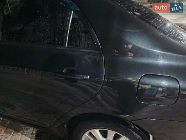 Чорний Тойота Королла, об'ємом двигуна 1.6 л та пробігом 207 тис. км за 6900 $, фото 3 на Automoto.ua