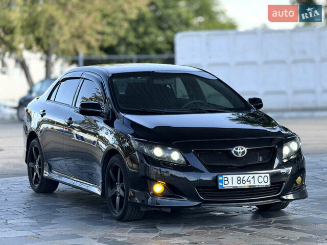 Чорний Тойота Королла, об'ємом двигуна 1.6 л та пробігом 221 тис. км за 6799 $, фото 1 на Automoto.ua