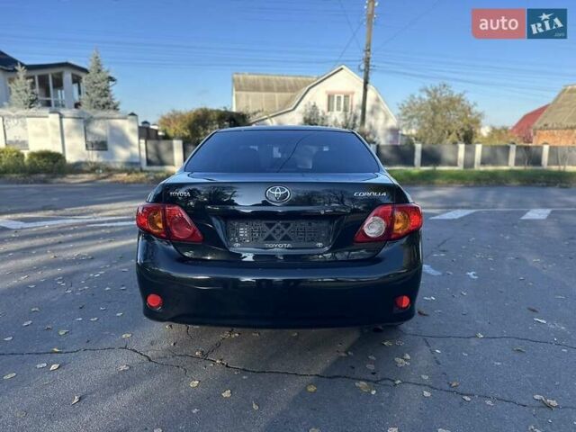 Чорний Тойота Королла, об'ємом двигуна 1.6 л та пробігом 193 тис. км за 5999 $, фото 41 на Automoto.ua