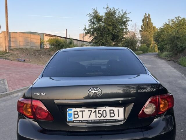 Чорний Тойота Королла, об'ємом двигуна 1.6 л та пробігом 290 тис. км за 5399 $, фото 7 на Automoto.ua