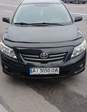 Черный Тойота Королла, объемом двигателя 1.6 л и пробегом 300 тыс. км за 7200 $, фото 1 на Automoto.ua