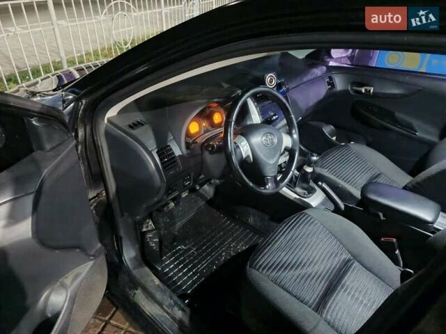 Чорний Тойота Королла, об'ємом двигуна 1.6 л та пробігом 207 тис. км за 6900 $, фото 7 на Automoto.ua
