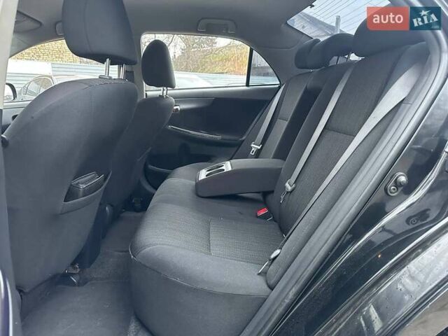 Чорний Тойота Королла, об'ємом двигуна 1.6 л та пробігом 316 тис. км за 7490 $, фото 9 на Automoto.ua