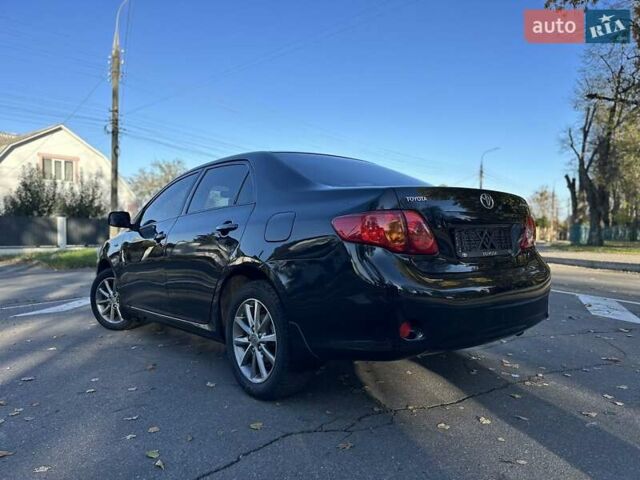 Чорний Тойота Королла, об'ємом двигуна 1.6 л та пробігом 193 тис. км за 5999 $, фото 37 на Automoto.ua