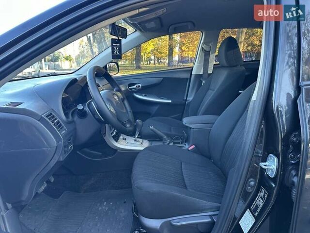 Чорний Тойота Королла, об'ємом двигуна 1.6 л та пробігом 193 тис. км за 5999 $, фото 12 на Automoto.ua