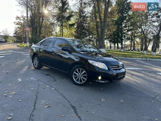 Чорний Тойота Королла, об'ємом двигуна 1.6 л та пробігом 193 тис. км за 5999 $, фото 40 на Automoto.ua