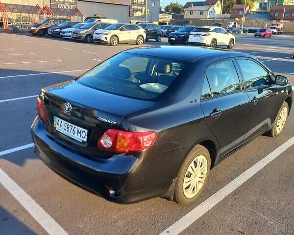 Чорний Тойота Королла, об'ємом двигуна 1.6 л та пробігом 235 тис. км за 6800 $, фото 3 на Automoto.ua