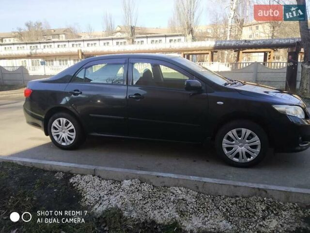 Чорний Тойота Королла, об'ємом двигуна 1.6 л та пробігом 215 тис. км за 7500 $, фото 2 на Automoto.ua