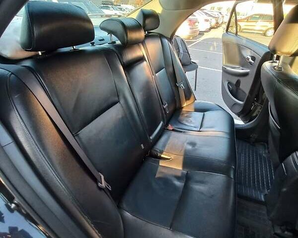 Чорний Тойота Королла, об'ємом двигуна 1.6 л та пробігом 235 тис. км за 6800 $, фото 15 на Automoto.ua