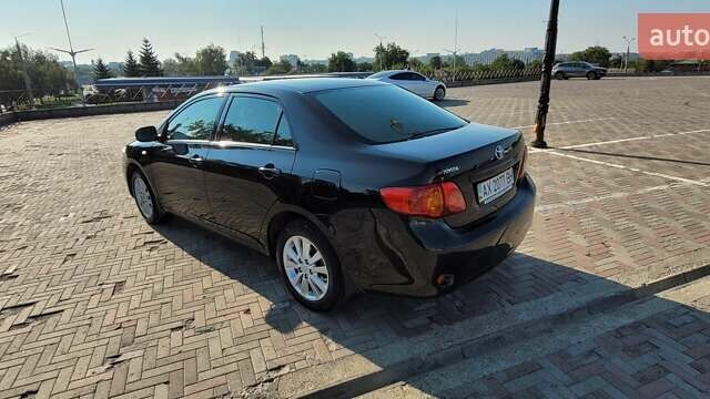 Чорний Тойота Королла, об'ємом двигуна 1.6 л та пробігом 254 тис. км за 6700 $, фото 4 на Automoto.ua
