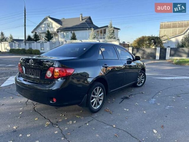Чорний Тойота Королла, об'ємом двигуна 1.6 л та пробігом 193 тис. км за 5999 $, фото 43 на Automoto.ua